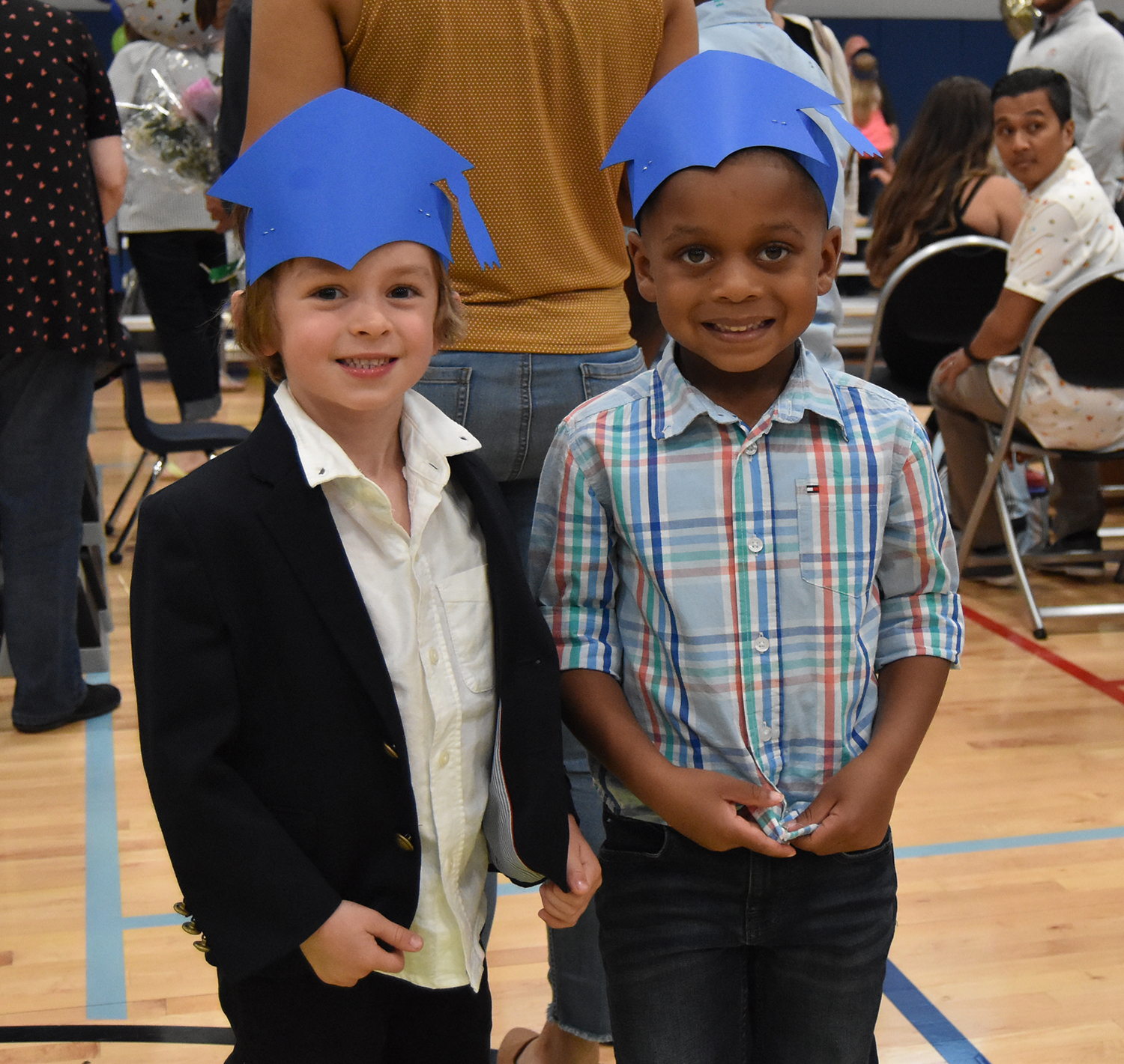 Two boys graduating from preschool